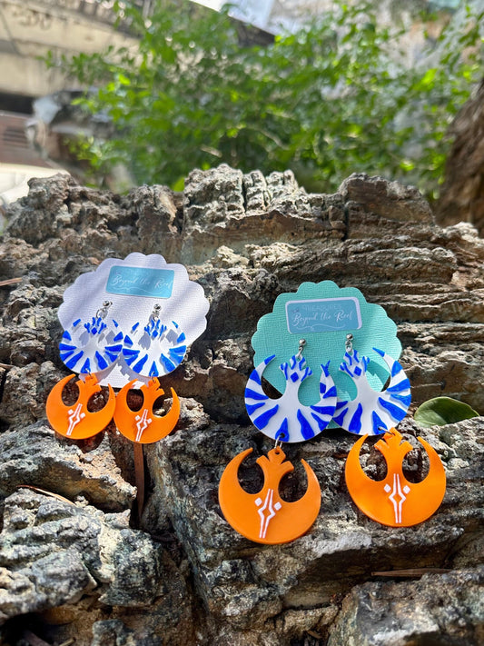 Rebel Alliance symbols inspired by Ahsoka Tano, laying on a rock